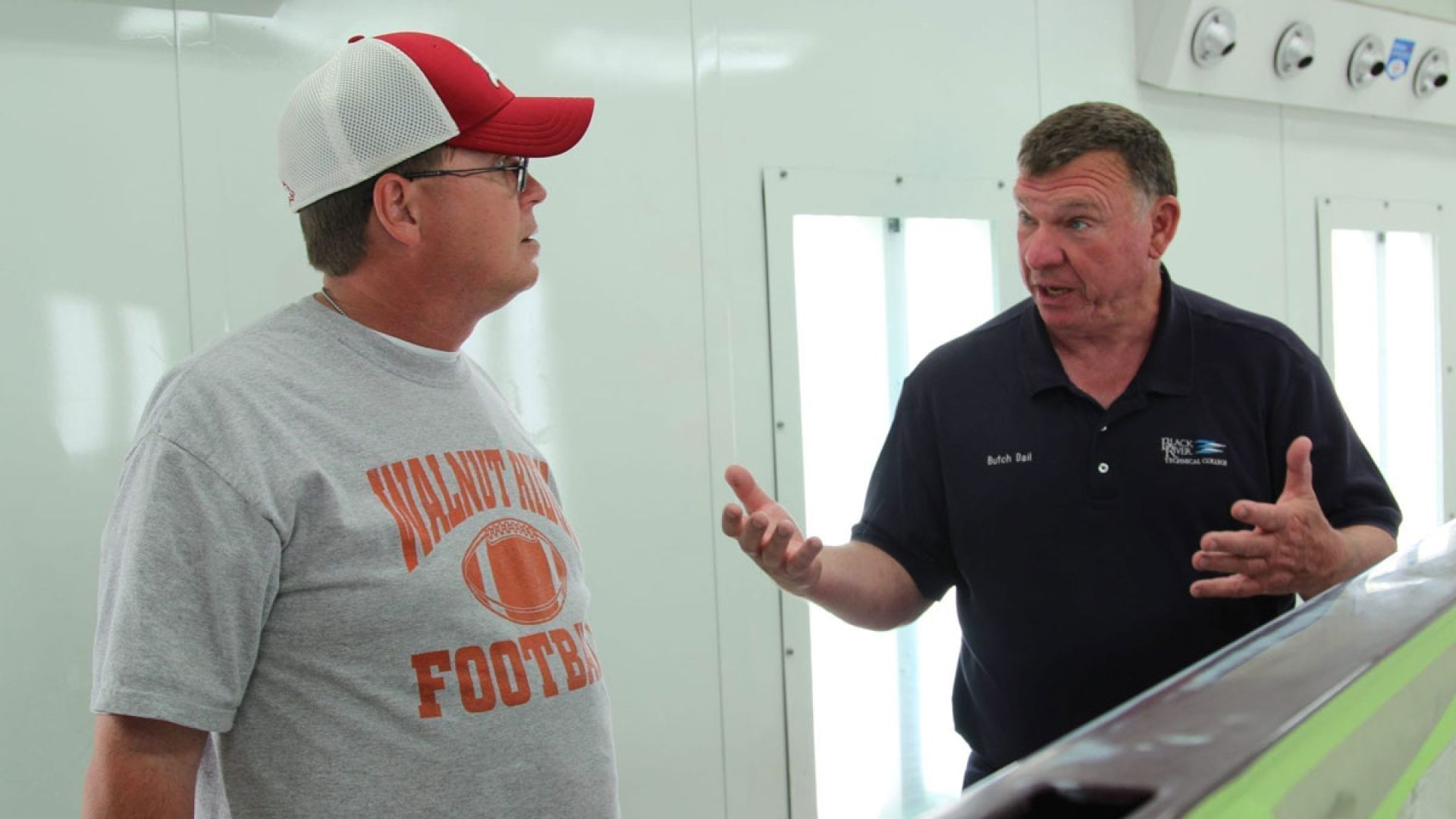 auto collision instructor speaking to student