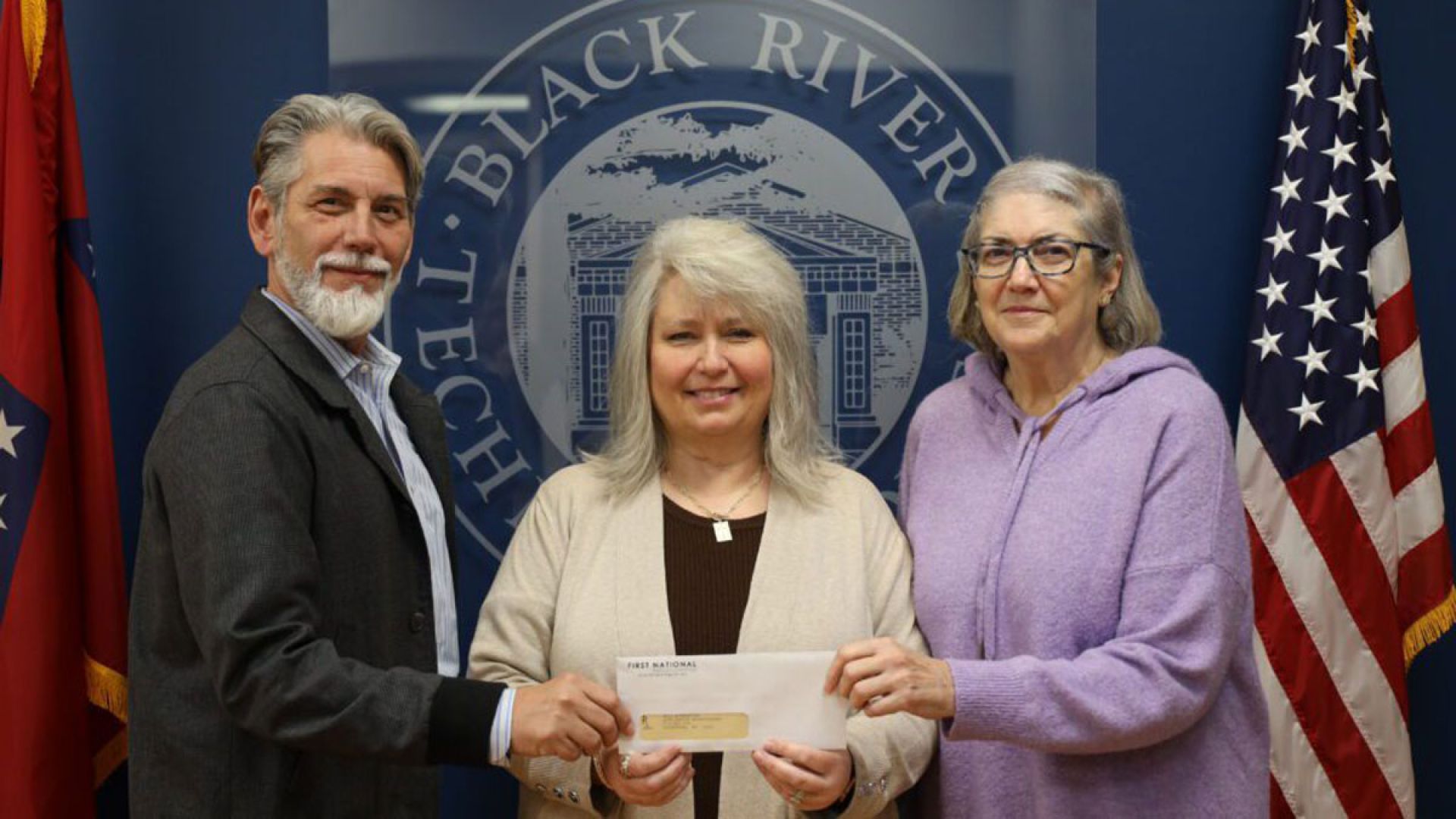 Paula Haskins presenting check to BRTC