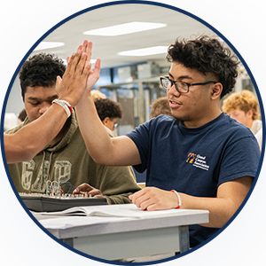 students high fiving